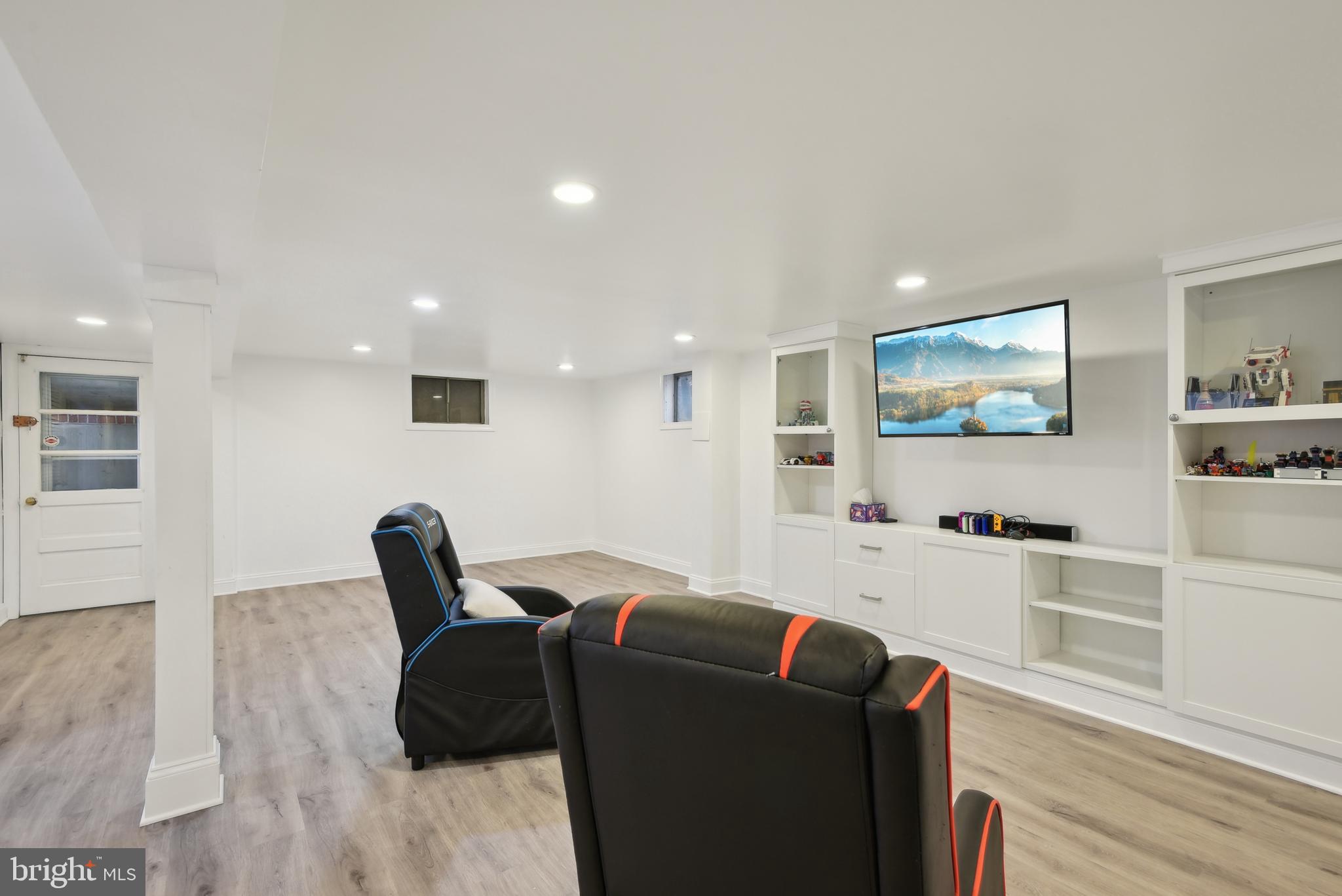 505 Devonshire Drive Northeast Vienna, VA 22180 - Photo 36 of 46 a living room with furniture and a wooden floor