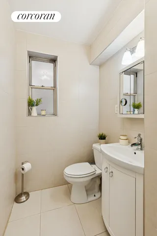 a bedroom with bed and a window