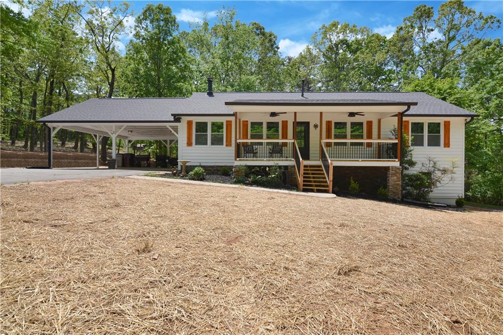 1083 Rampley Trail Canton, GA 30114 - Photo 1 of 1 a front view of a house with a yard