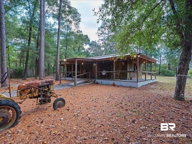 4650 Wiggins Lane Wilmer, AL 36587 - Photo 44 of 66 Rear view of house featuring a deck