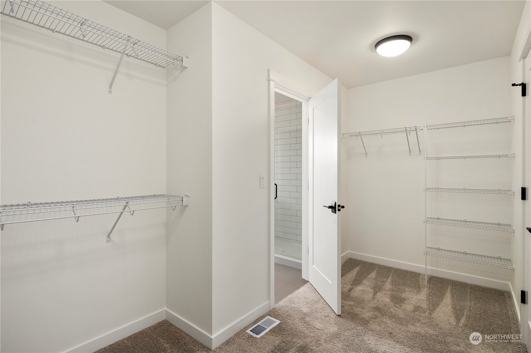 15 179th Place Southwest Bothell, WA 98012 - Photo 23 of 30 a view of an empty walk in closet