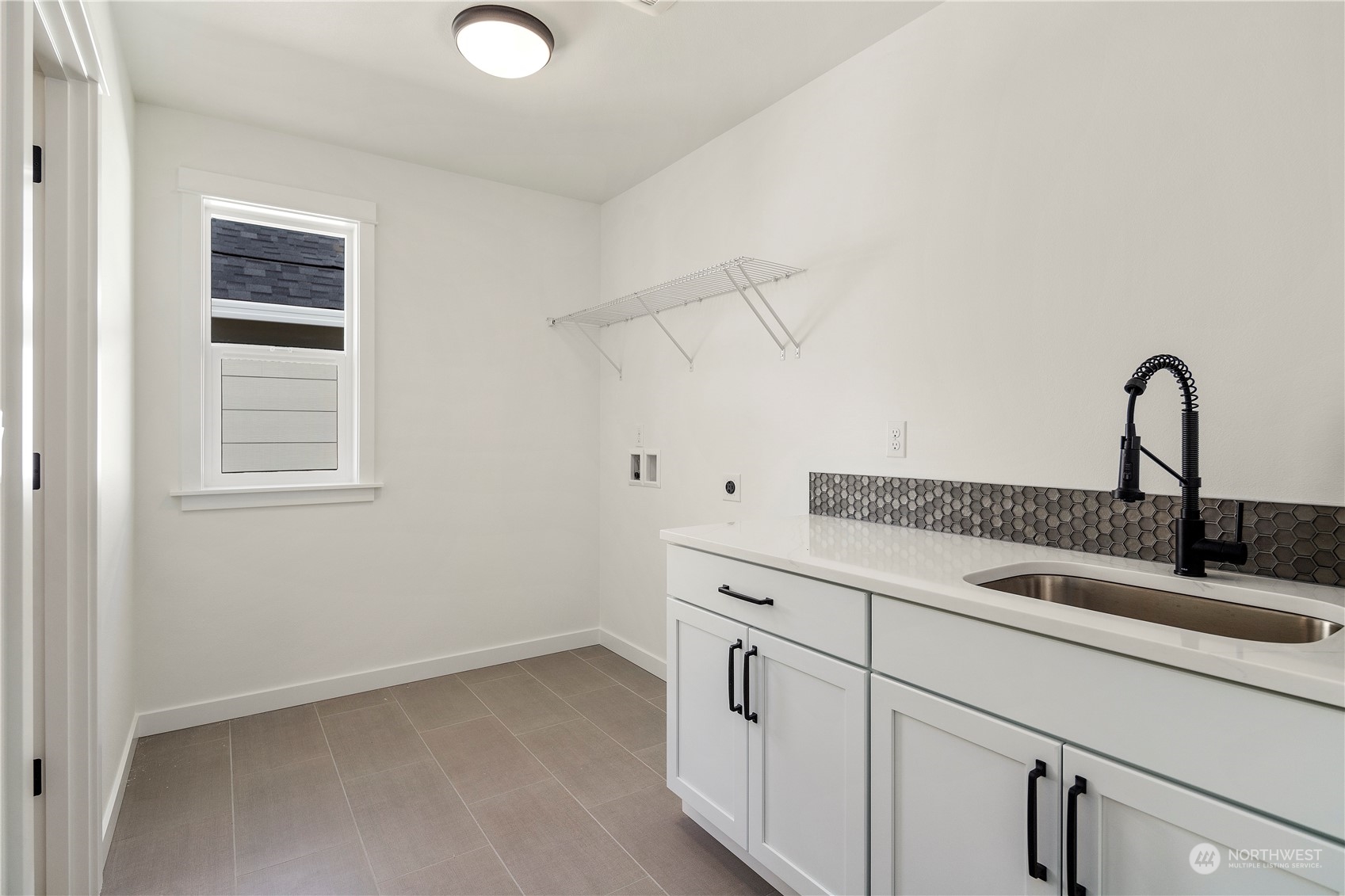 15 179th Place Southwest Bothell, WA 98012 - Photo 24 of 30 a kitchen with cabinets and sink