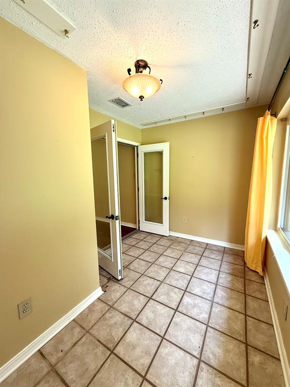 11535 Timber Ridge Drive Keithville, LA 71047 - Photo 27 of 39 a view of a livingroom with a chandelier