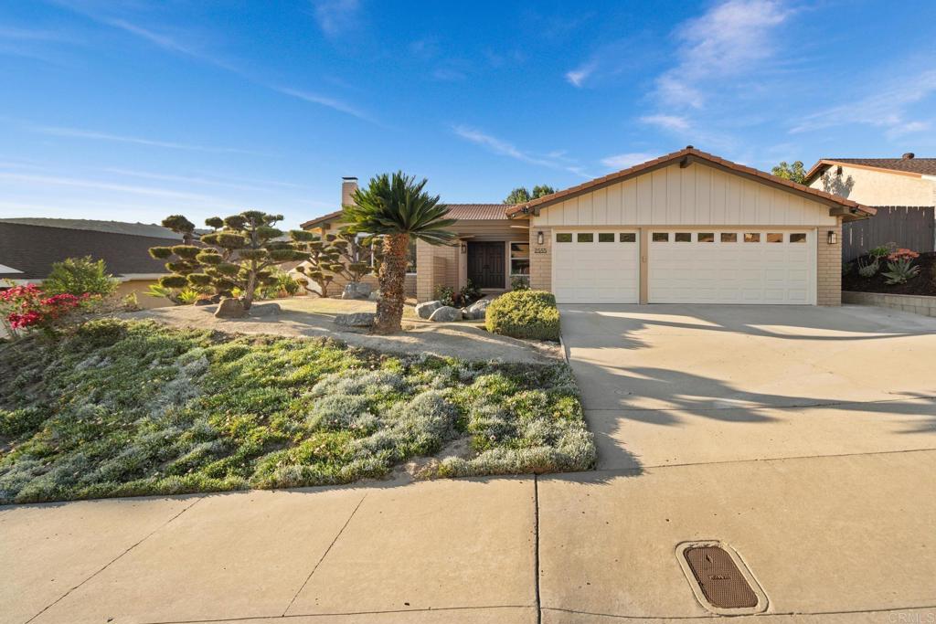 2555 Windmill View Road El Cajon, CA 92020 - Photo 1 of 1 a view of a house with a yard