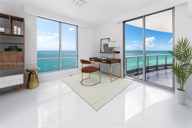a kitchen with a table and chairs