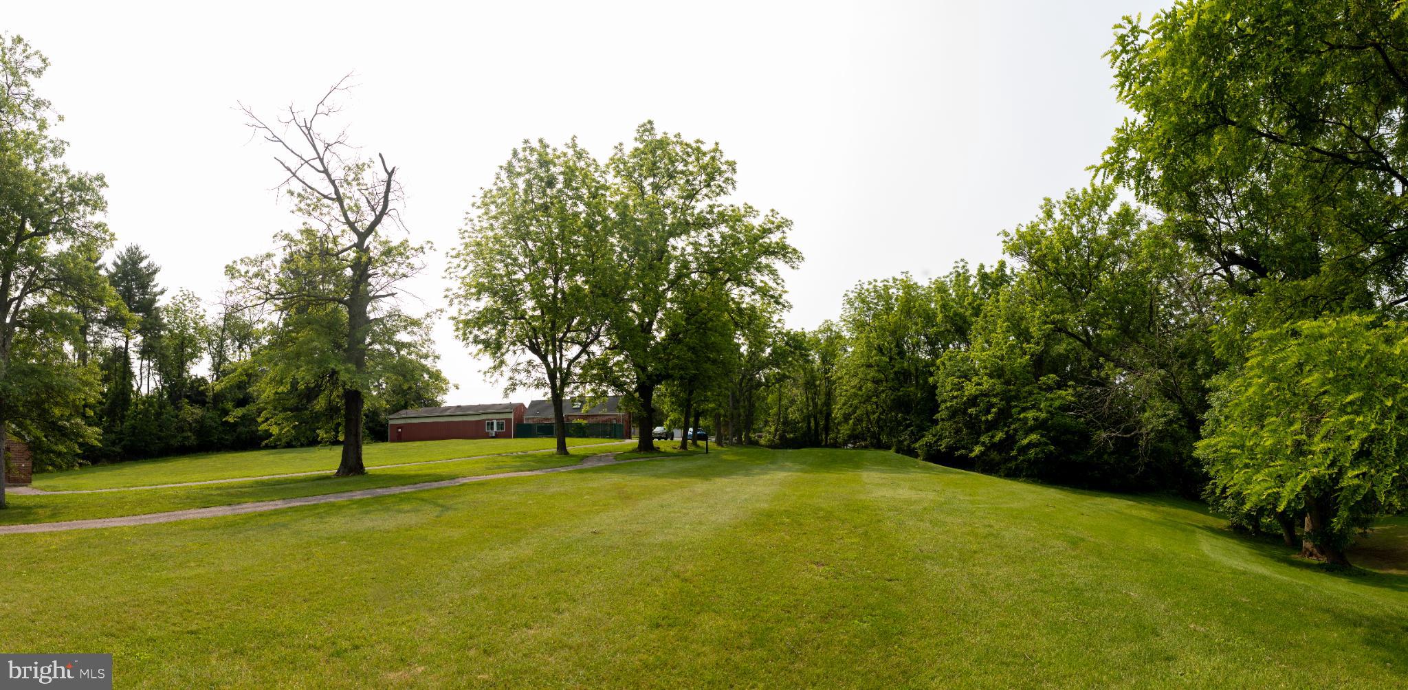 0 Log Cabin Road York, PA 17408 - Photo 19 of 23 Lush green expanse under a serene sky.