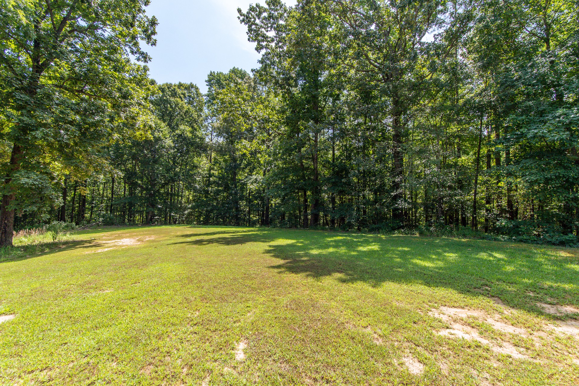 915 Cliffview Road Bolivar, TN 38008 - Photo 17 of 89 a view of a swimming pool with an outdoor space and seating area