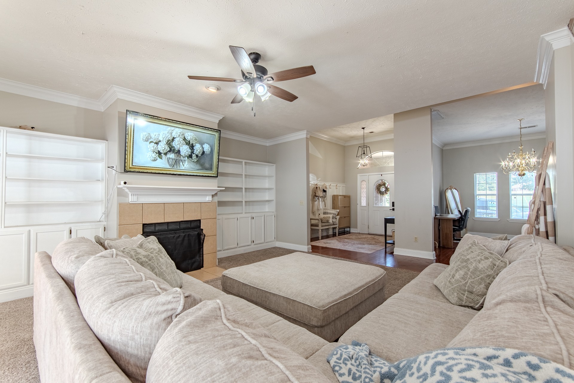 915 Cliffview Road Bolivar, TN 38008 - Photo 26 of 89 a bedroom with a bed and a chandelier