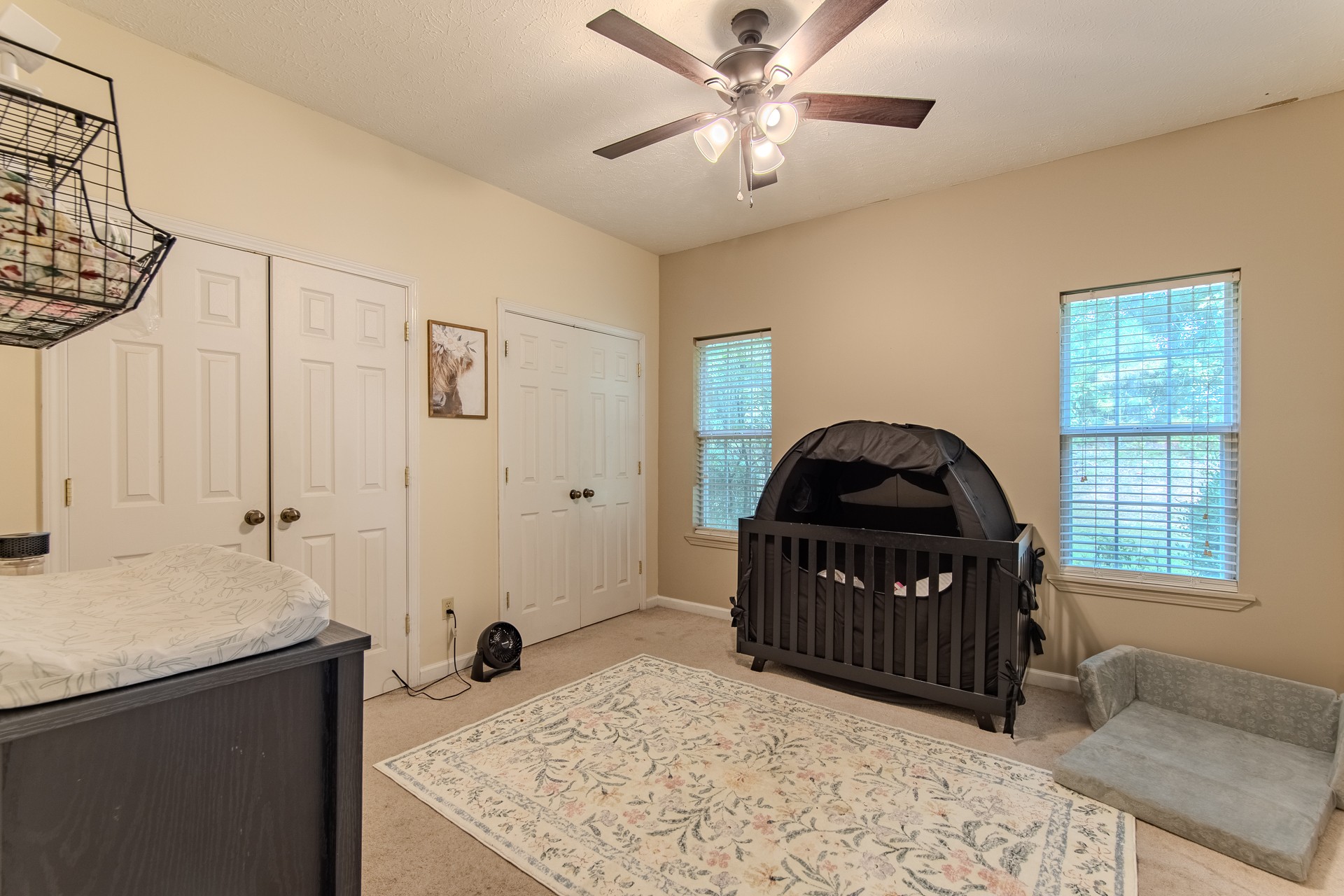 915 Cliffview Road Bolivar, TN 38008 - Photo 40 of 89 a bedroom with a bed and a dresser