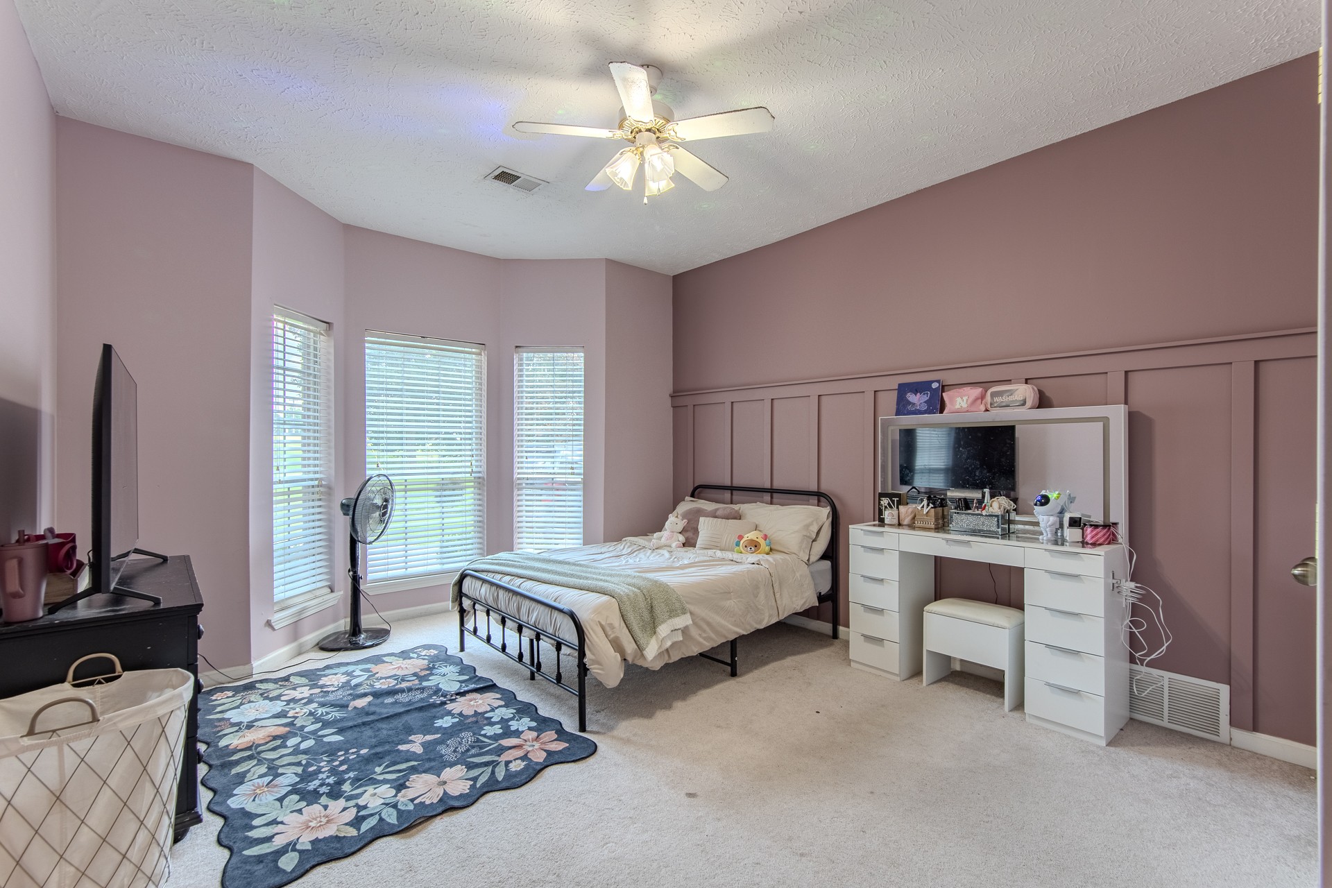 915 Cliffview Road Bolivar, TN 38008 - Photo 45 of 89 a bedroom with a bed and a chandelier