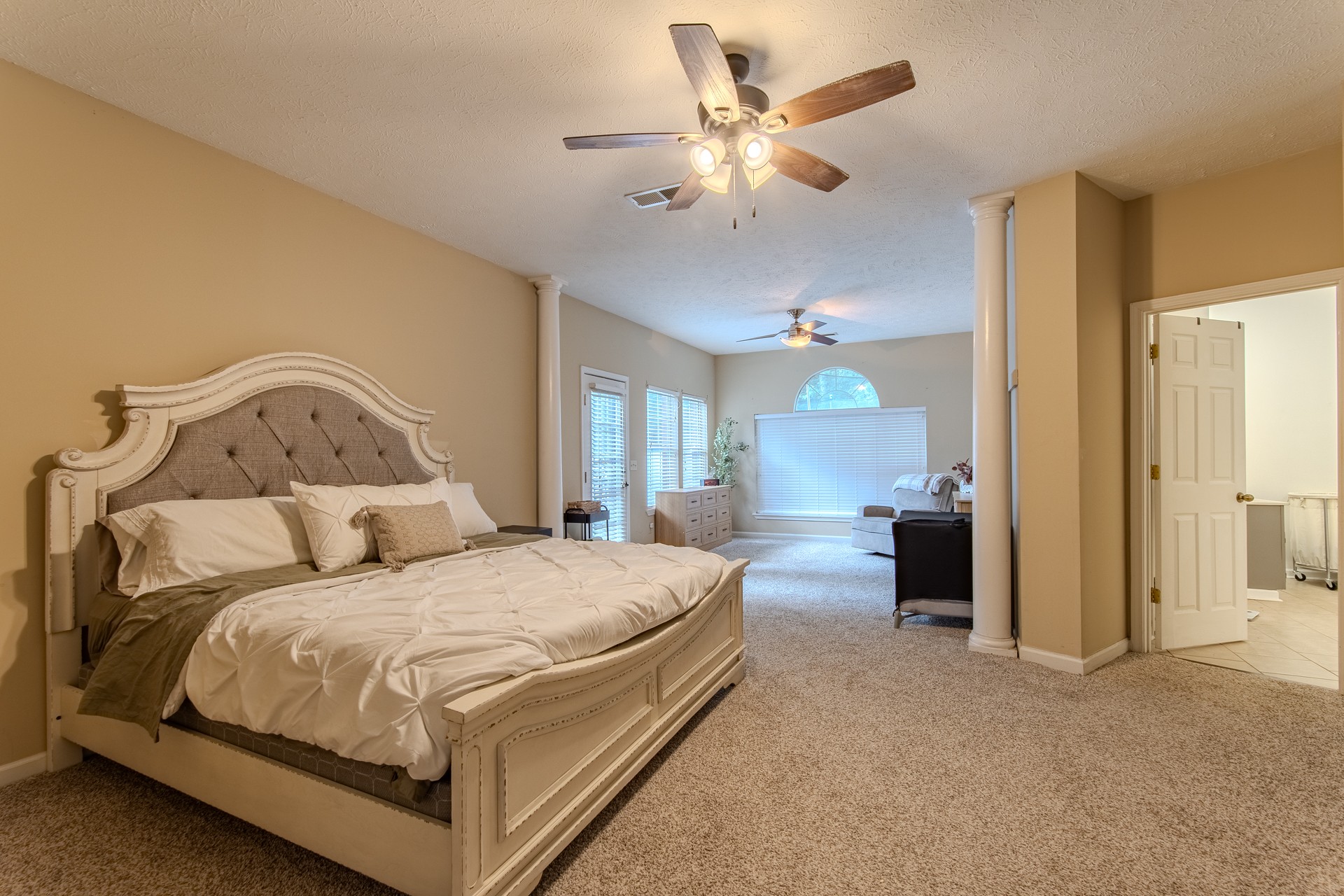 915 Cliffview Road Bolivar, TN 38008 - Photo 51 of 89 a bedroom with a bed and a chandelier