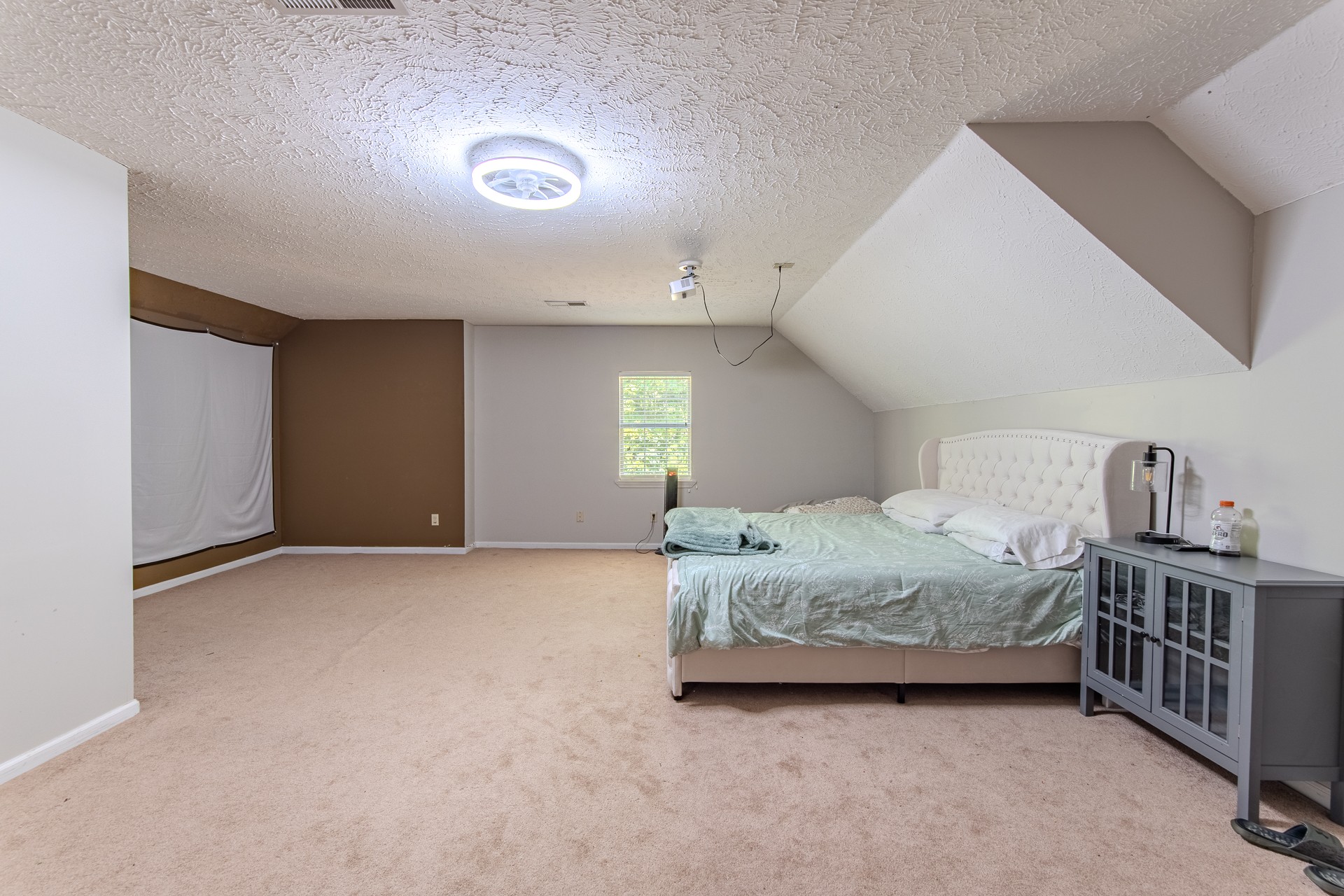915 Cliffview Road Bolivar, TN 38008 - Photo 88 of 89 a bedroom with a bed and cabinets