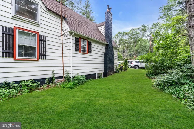a backyard of a house with lots of green space