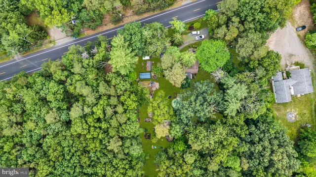 a aerial view of a house with swimming pool