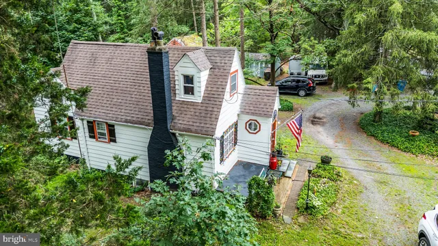 a house with a tree in front of it