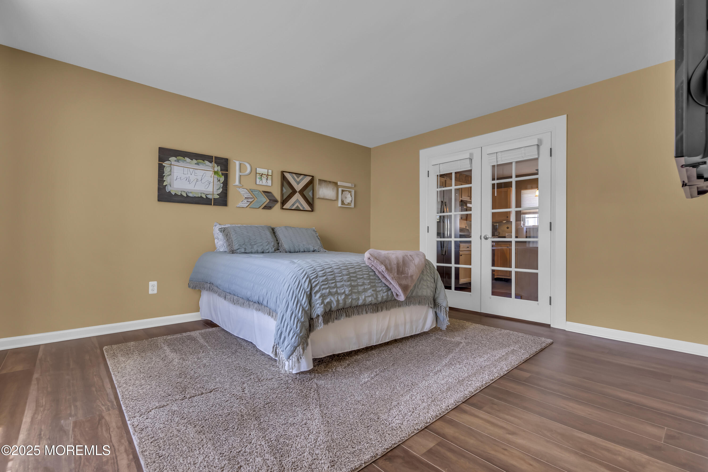 1839 Breakers Drive Manahawkin, NJ 08050 - Photo 13 of 52 a bedroom with a bed and a window