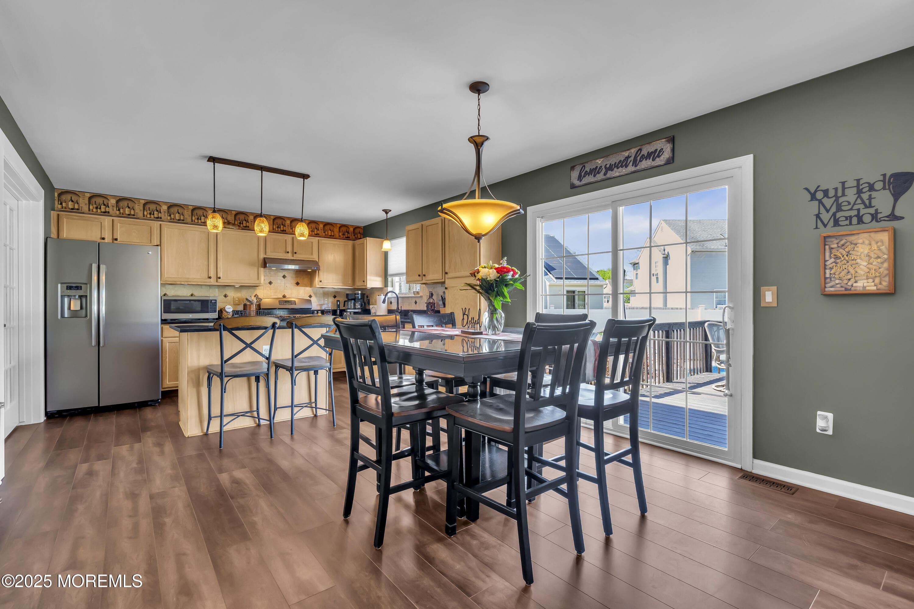 1839 Breakers Drive Manahawkin, NJ 08050 - Photo 17 of 52 a view of a dining room with furniture window and wooden floor