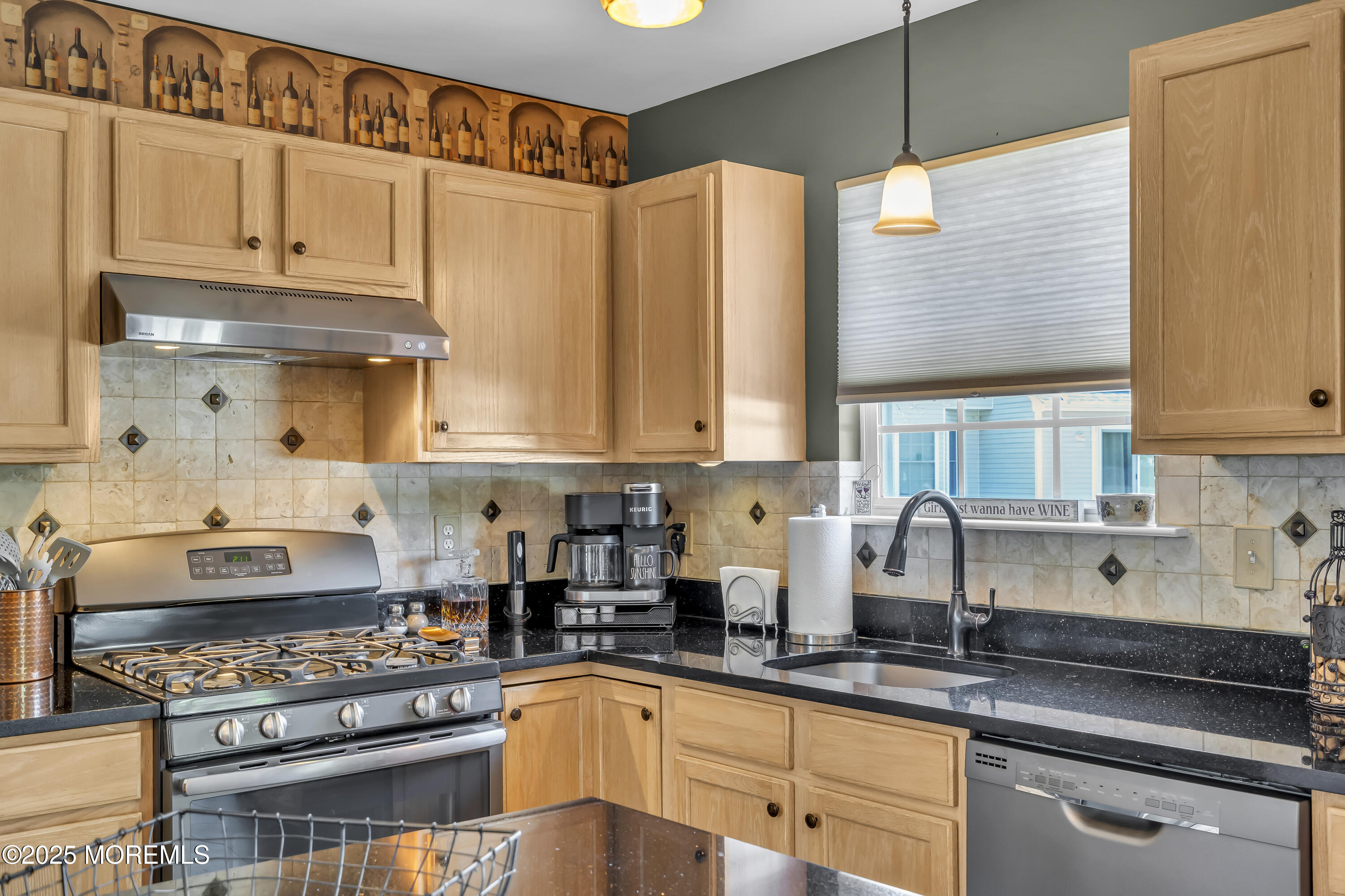 1839 Breakers Drive Manahawkin, NJ 08050 - Photo 21 of 52 a kitchen with stainless steel appliances granite countertop a stove a sink and a white cabinets