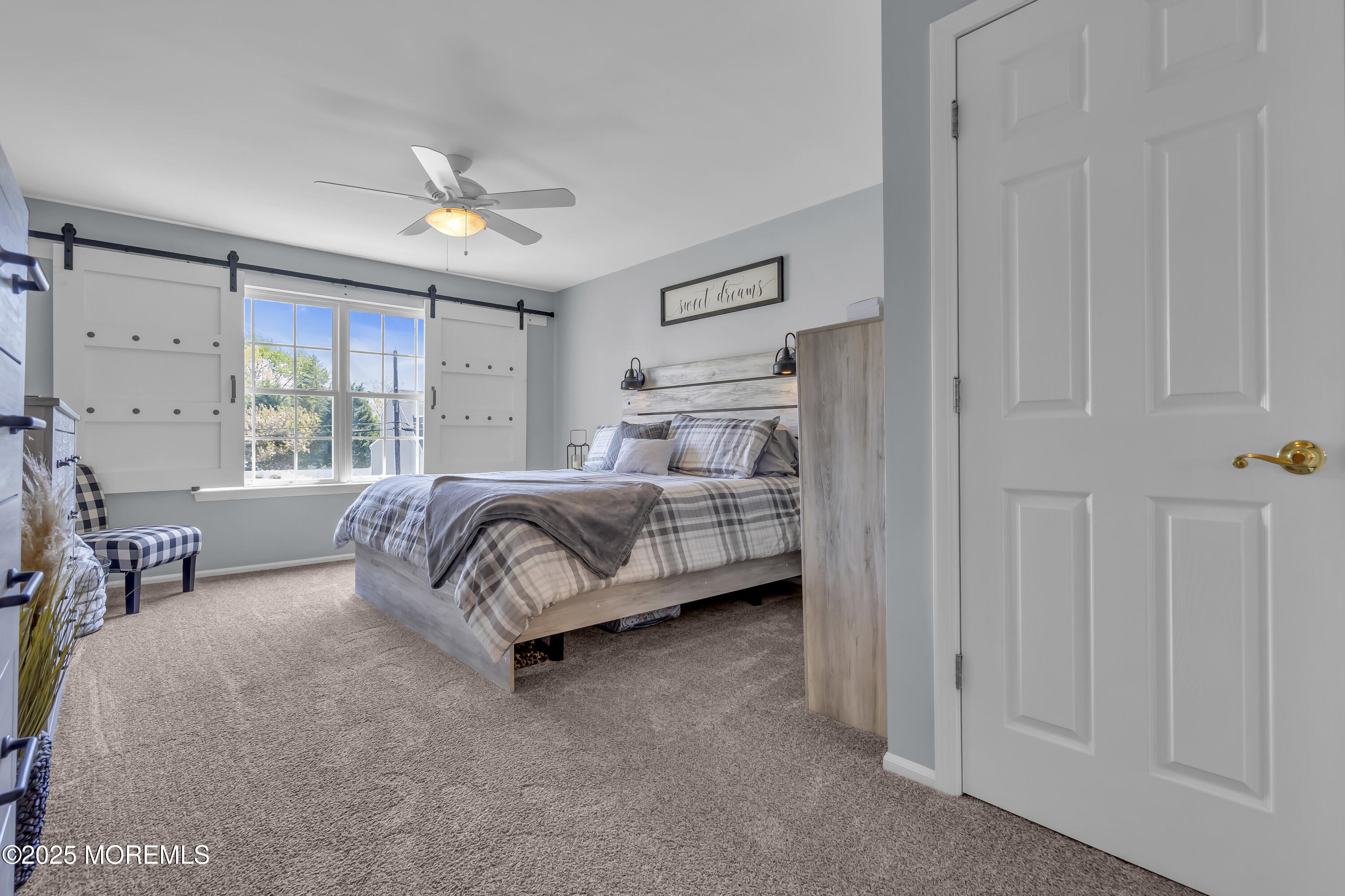 1839 Breakers Drive Manahawkin, NJ 08050 - Photo 31 of 52 a bedroom with a bed couch and a window