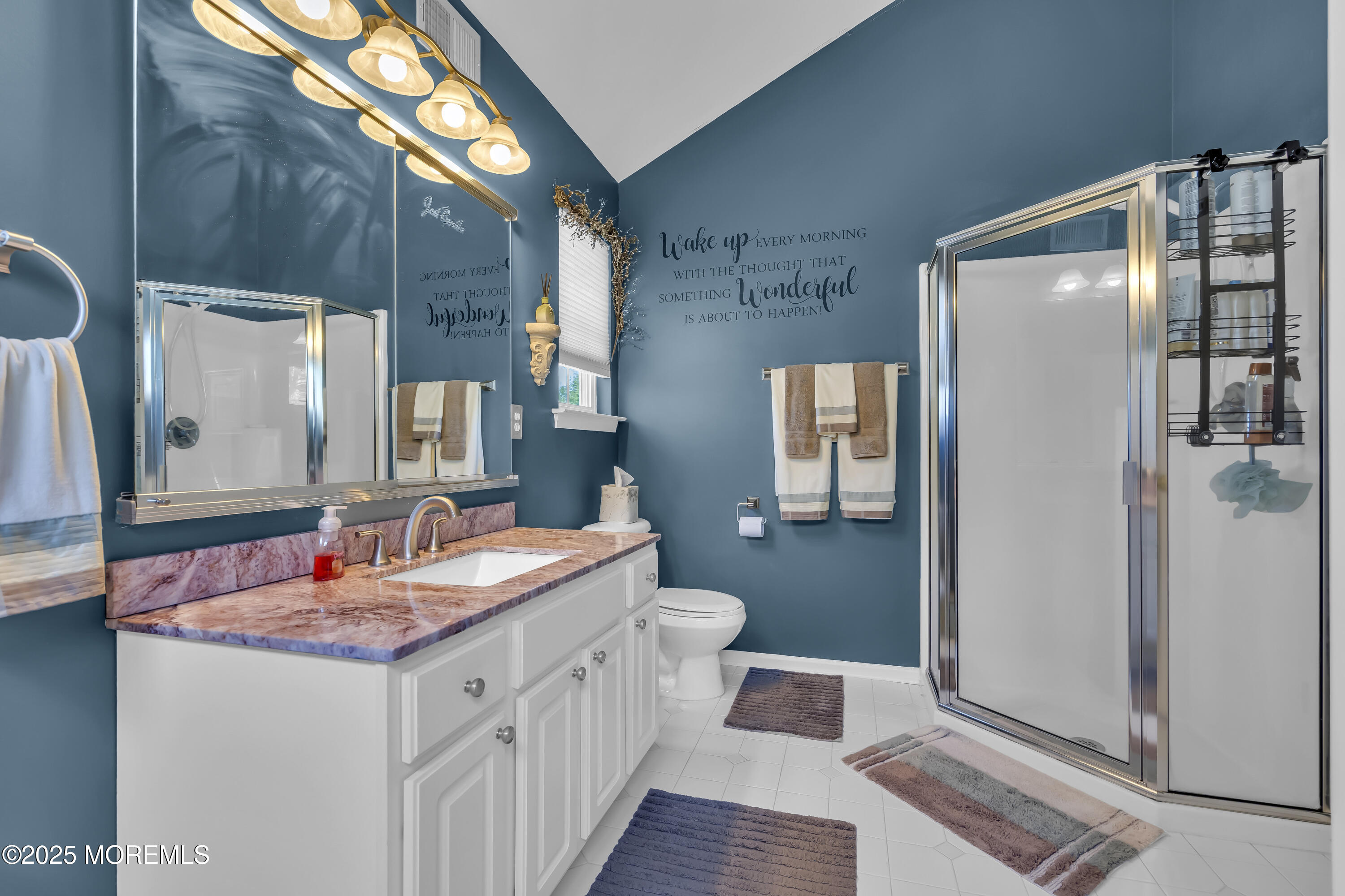 1839 Breakers Drive Manahawkin, NJ 08050 - Photo 35 of 52 a bathroom with a granite countertop sink and a mirror