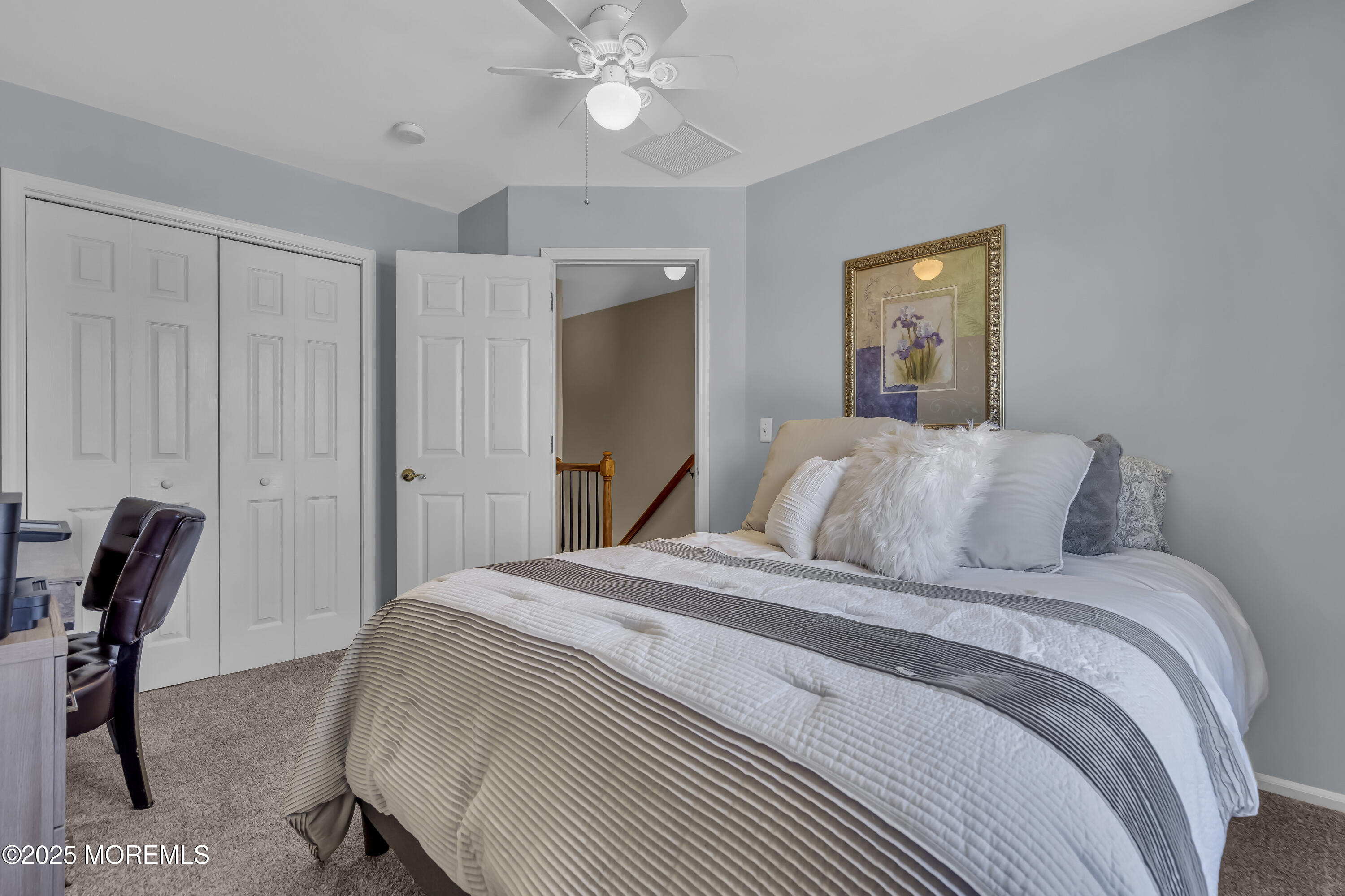 1839 Breakers Drive Manahawkin, NJ 08050 - Photo 39 of 52 a bedroom with a bed and a chair