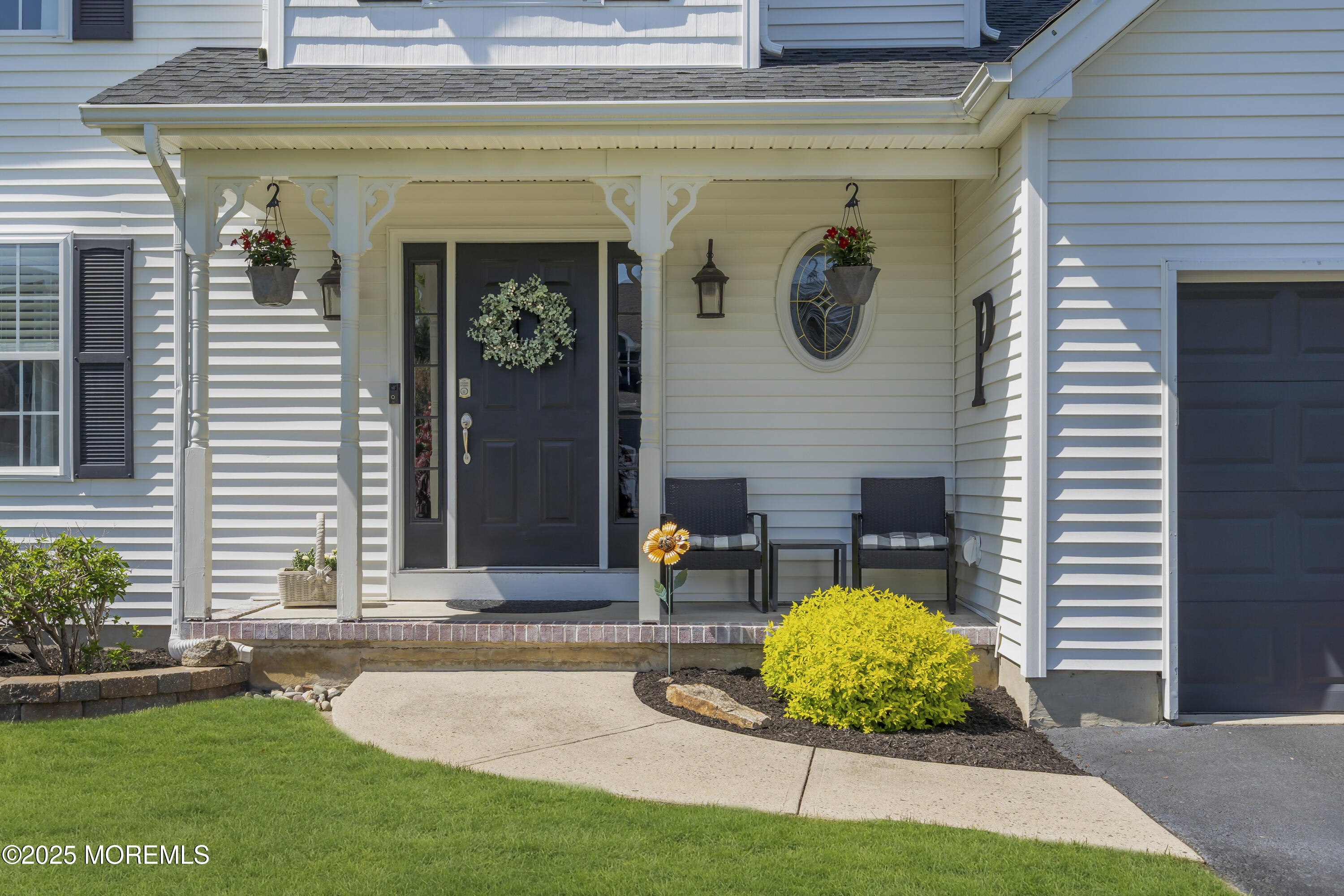 1839 Breakers Drive Manahawkin, NJ 08050 - Photo 4 of 52 a front view of a house with patio