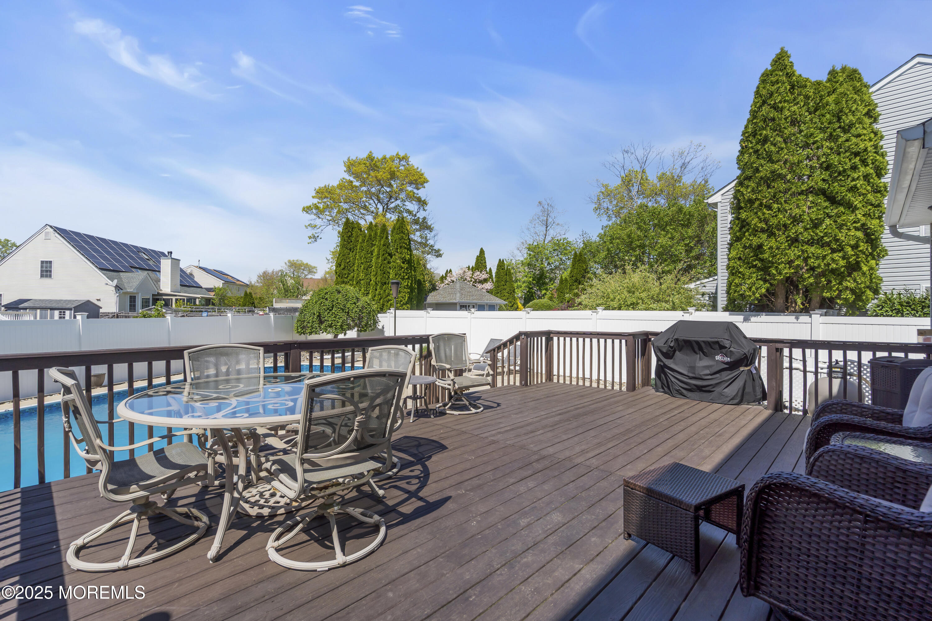 1839 Breakers Drive Manahawkin, NJ 08050 - Photo 43 of 52 a view of a chairs and table on the deck