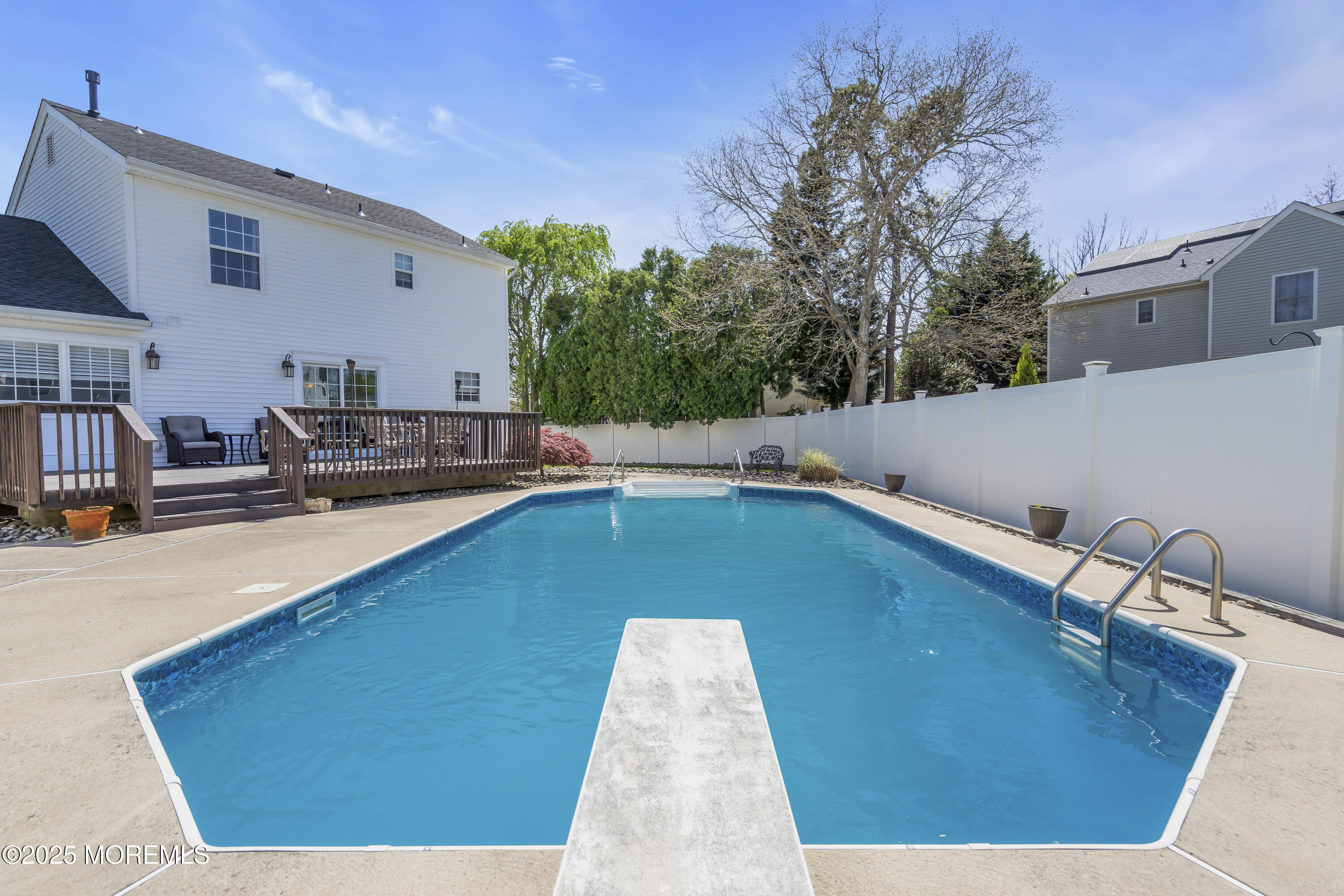 1839 Breakers Drive Manahawkin, NJ 08050 - Photo 47 of 52 a view of a patio with swimming pool