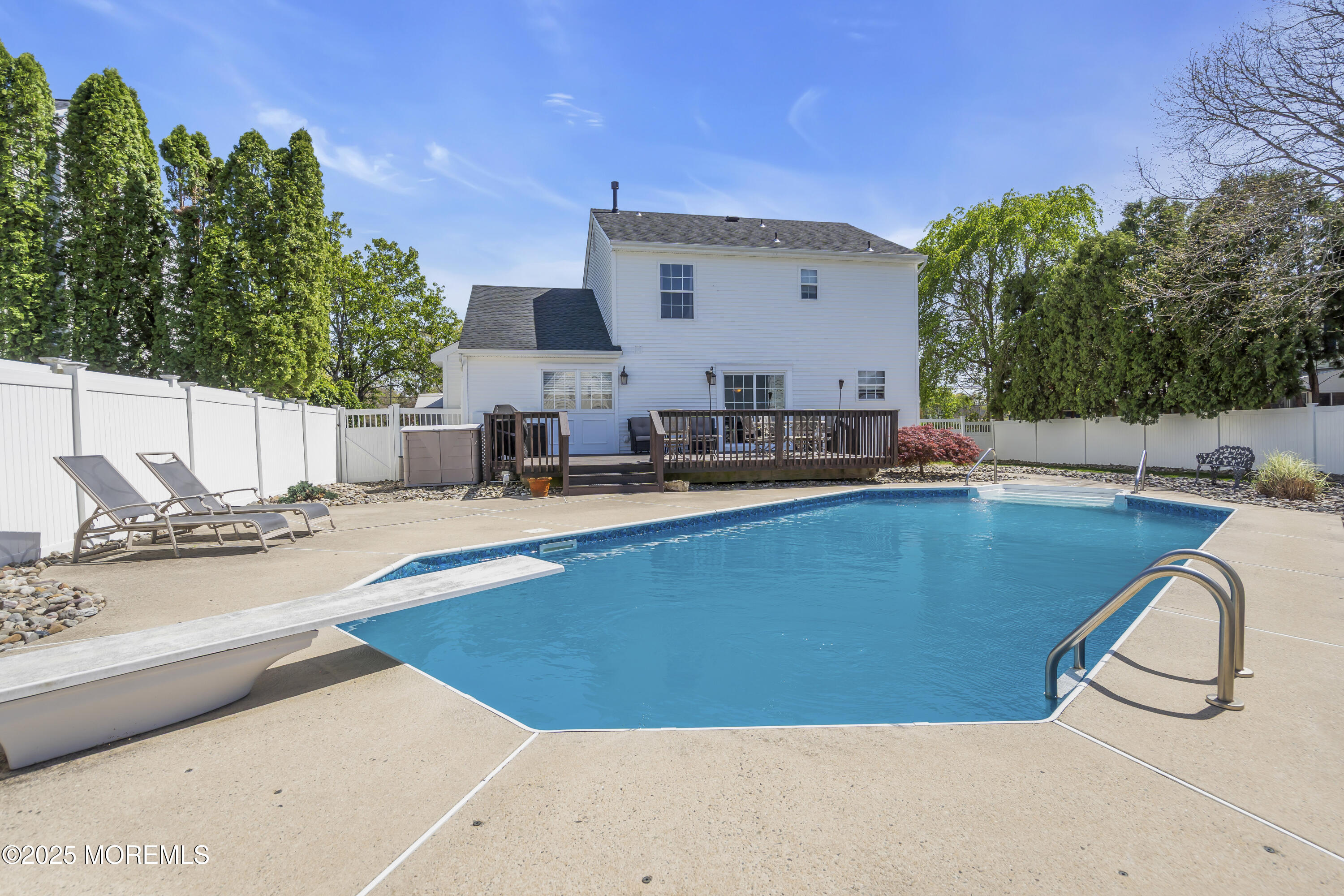 1839 Breakers Drive Manahawkin, NJ 08050 - Photo 48 of 52 a swimming pool with outdoor seating and yard