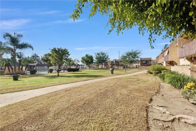 a view of a playground with basketball court