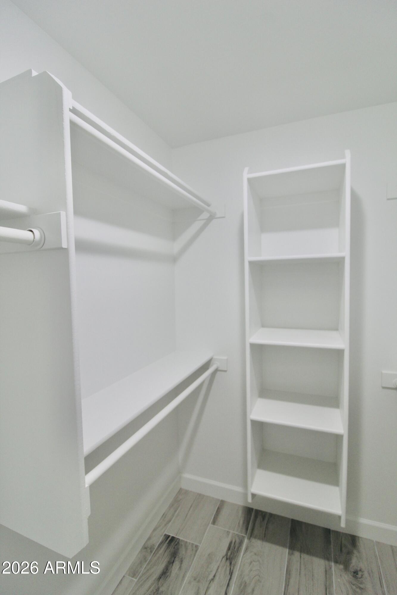 20275 East Mesa Verde Road, Unit 503 Mayer, AZ 86333 - Photo 20 of 32 a view of an empty walk in closet