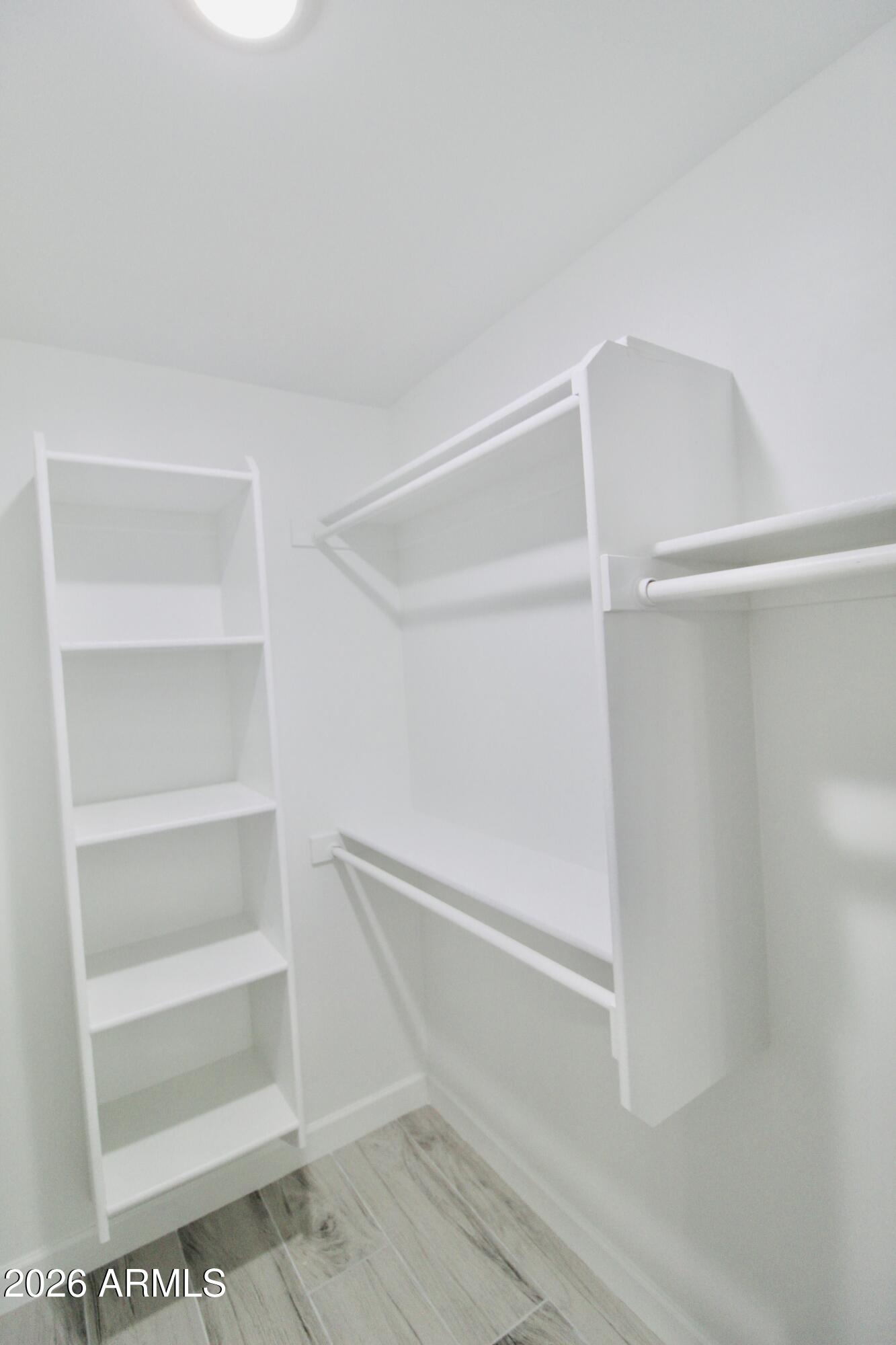 20275 East Mesa Verde Road, Unit 503 Mayer, AZ 86333 - Photo 21 of 32 a view of an empty walk in closet