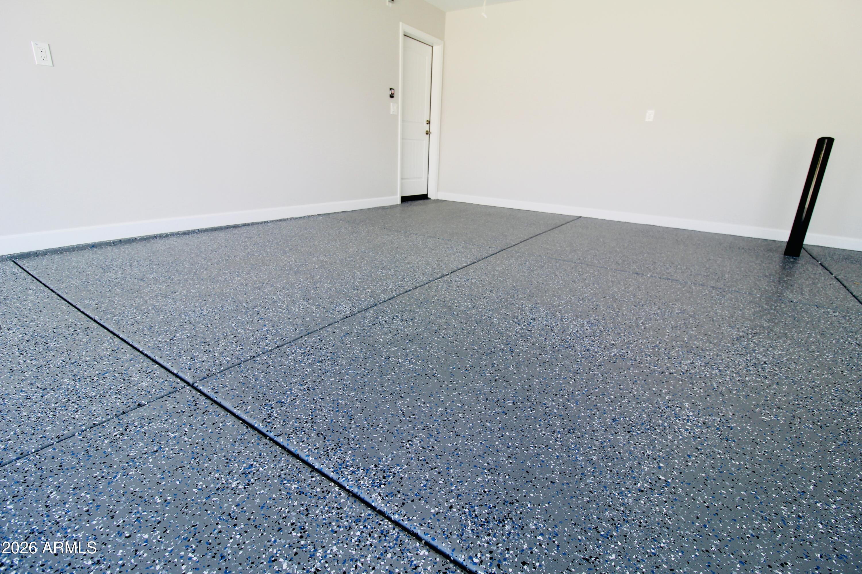 20275 East Mesa Verde Road, Unit 503 Mayer, AZ 86333 - Photo 30 of 32 EPOXY-COATED FLOORING
