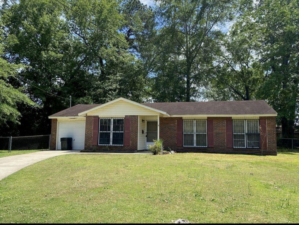 8 Horseshoe Court Columbus, GA 31906 - Photo 1 of 1 a front view of house with yard and trees around