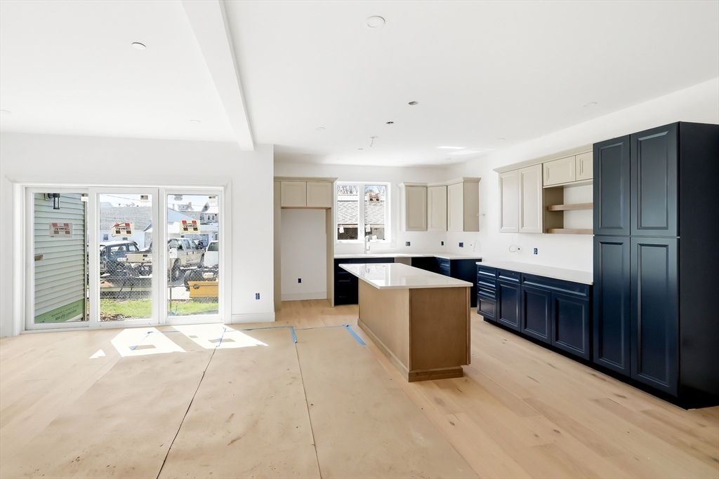 5 Elizabeth Lane, Unit 5 Paxton, MA 01612 - Photo 6 of 26 a large room with a large window and kitchen view