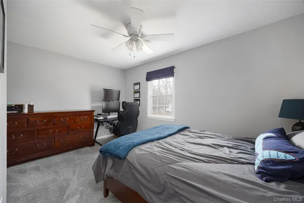 a bedroom with a bed and furniture