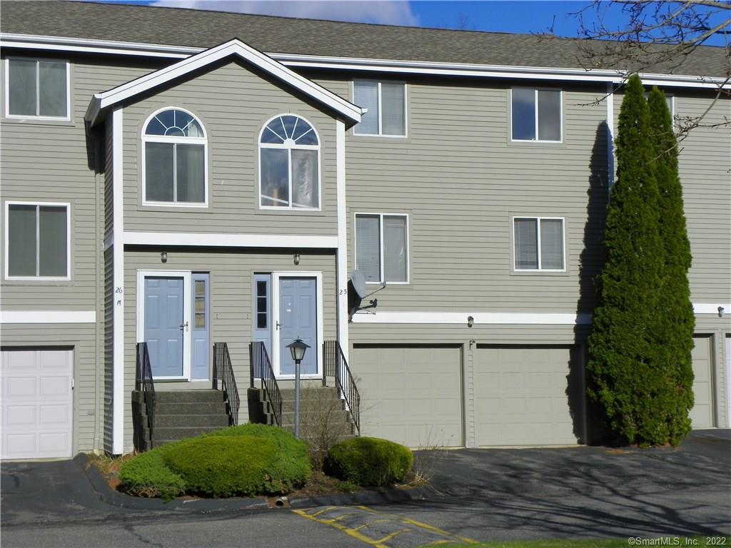 111 Riverton Road, Unit 25 Winchester, CT 06098 - Photo 1 of 1 a front view of a house with a yard