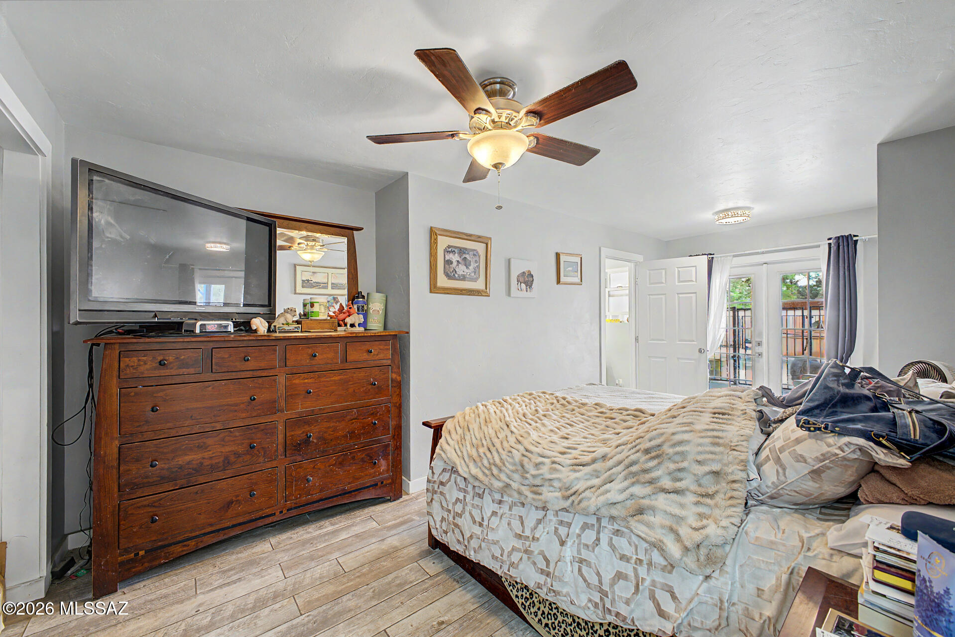 1172 East Allen Road Tucson, AZ 85719 - Photo 11 of 25 a bedroom with a bed and furniture