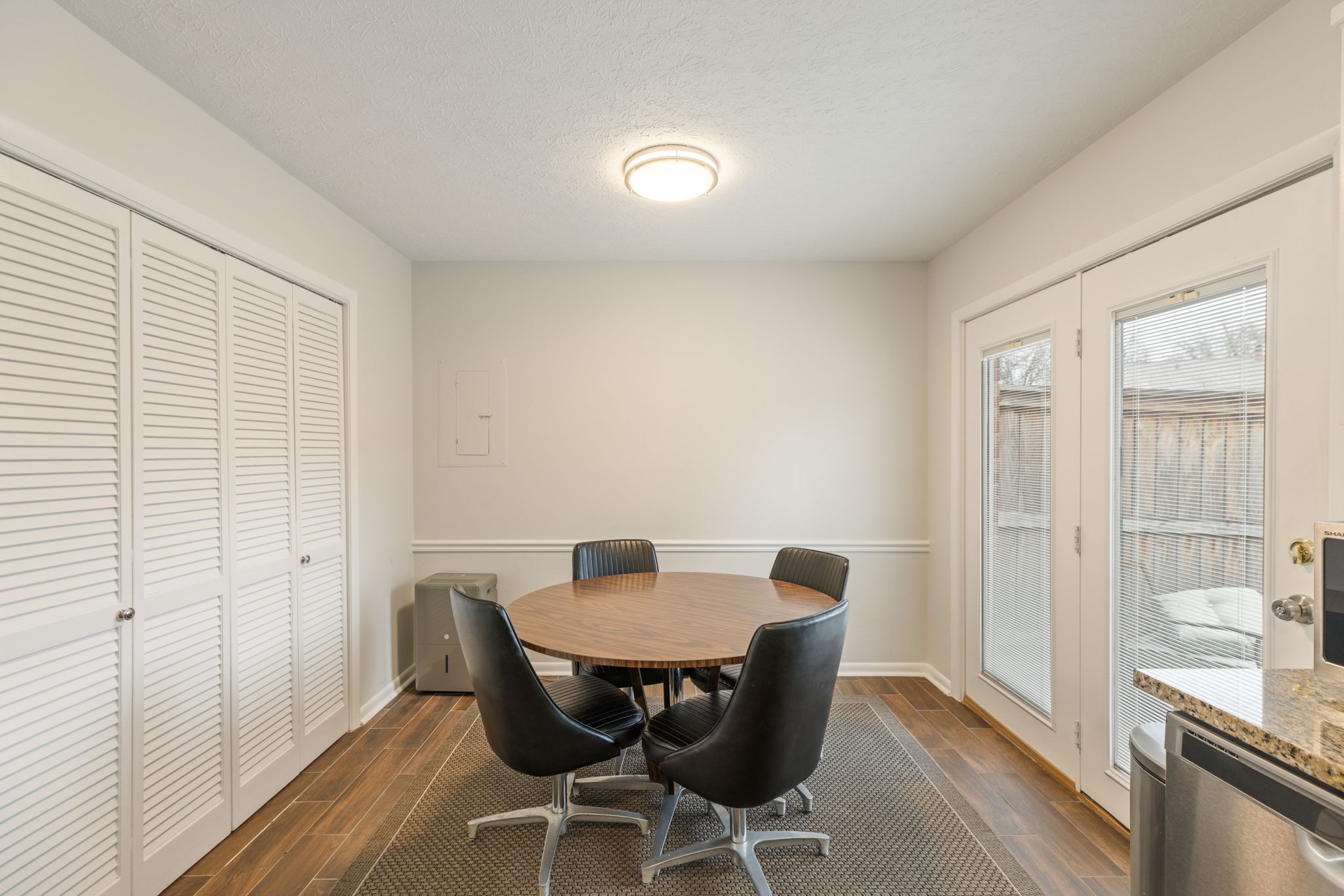 104 Meredith Place Franklin, TN 37064 - Photo 20 of 63 a view of a dining room with furniture and wooden floor