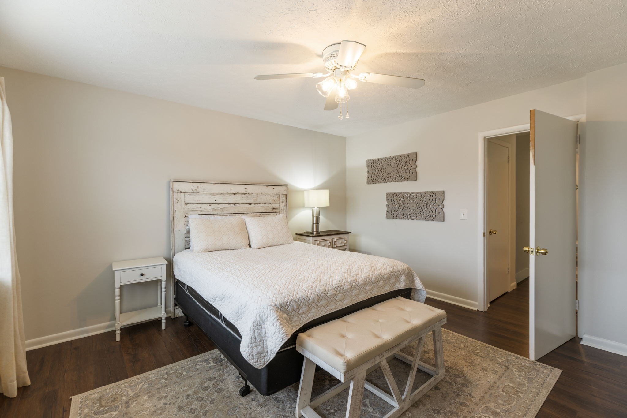 104 Meredith Place Franklin, TN 37064 - Photo 27 of 63 a bedroom with a bed and a chandelier