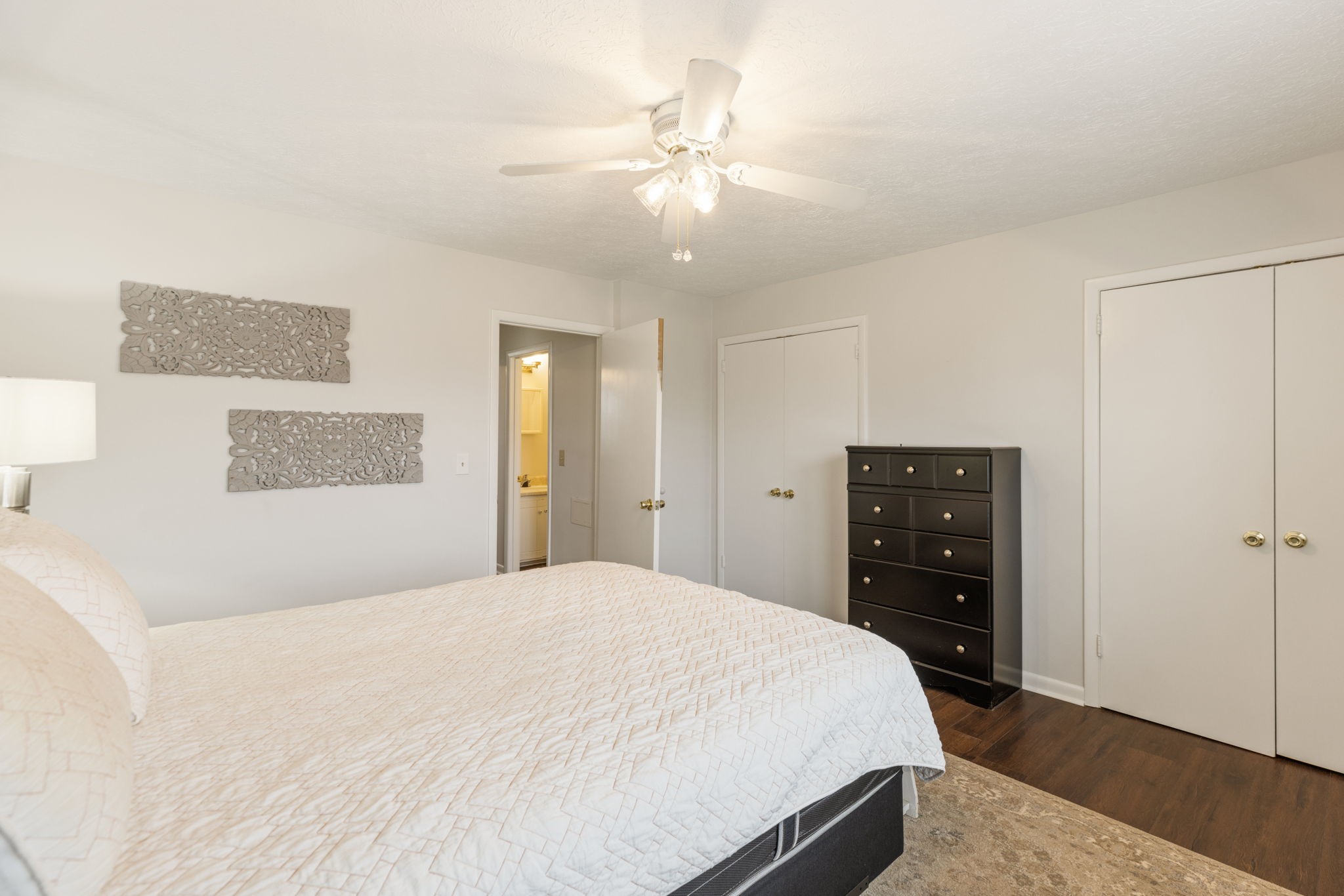 104 Meredith Place Franklin, TN 37064 - Photo 28 of 63 a bedroom with a bed and a ceiling fan