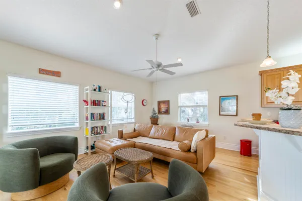 a living room with furniture and a window