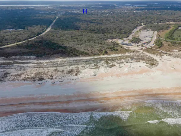 a view of a road with an ocean view