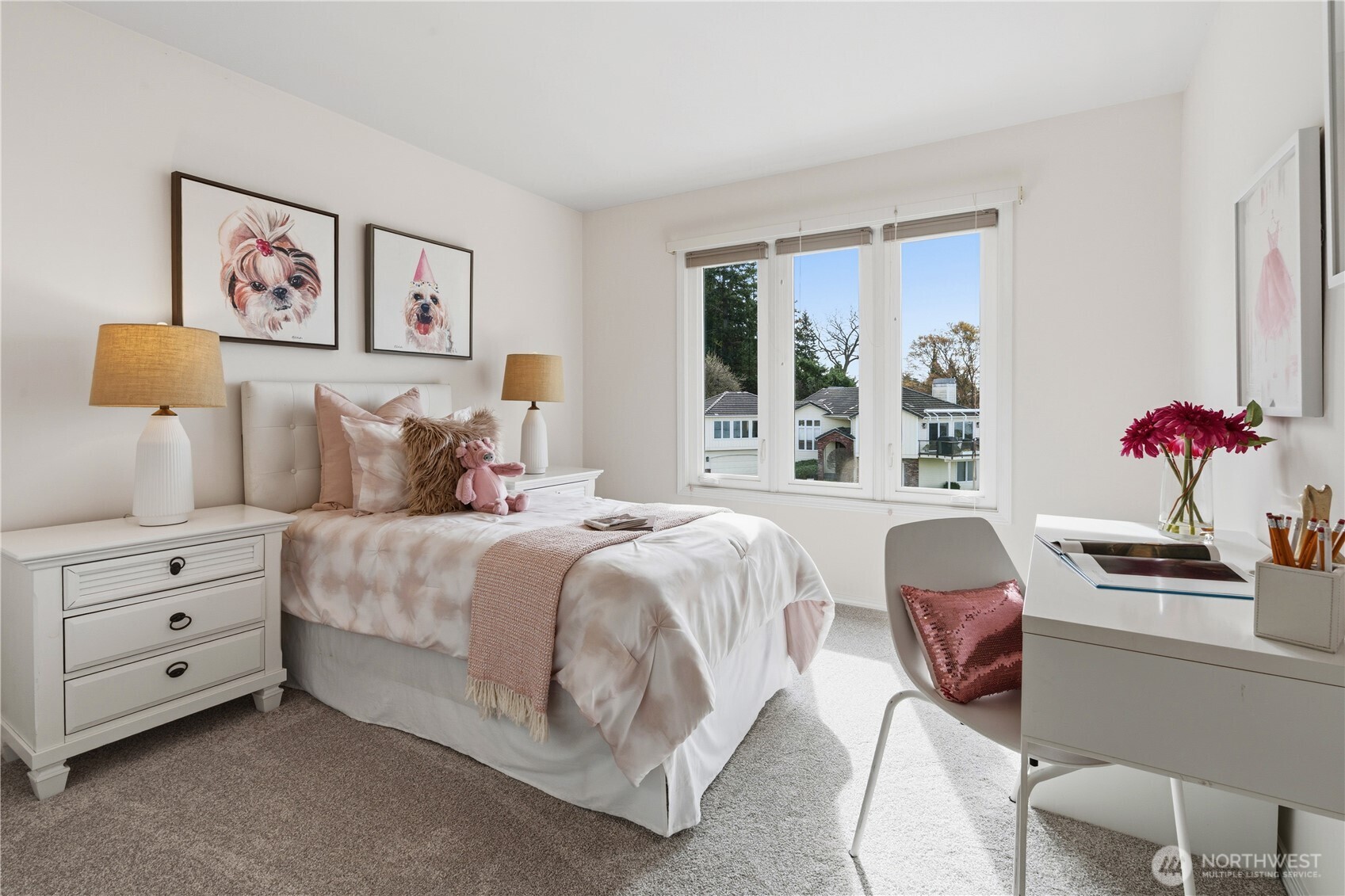 2626 Northwest 204th Street Shoreline, WA 98177 - Photo 17 of 35 a bedroom with a bed and a chandelier