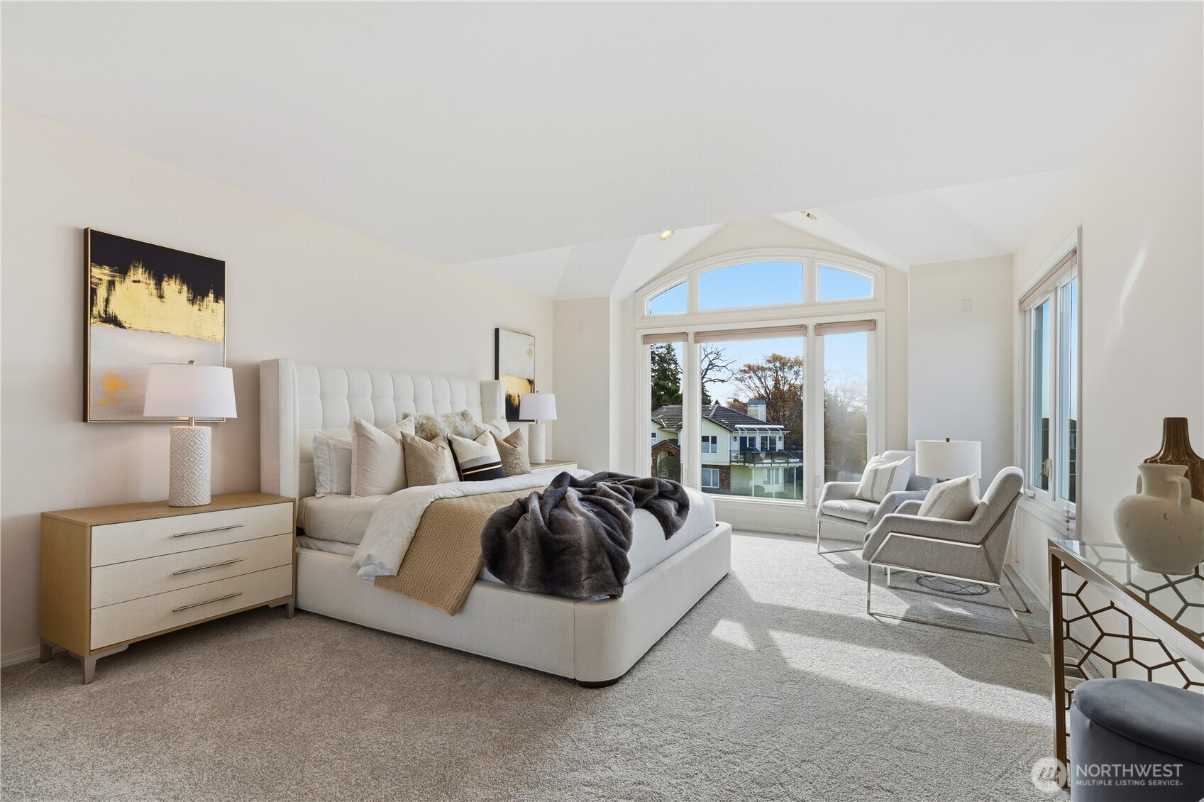 2626 Northwest 204th Street Shoreline, WA 98177 - Photo 21 of 35 a spacious bedroom with a bed and glass walk in closet