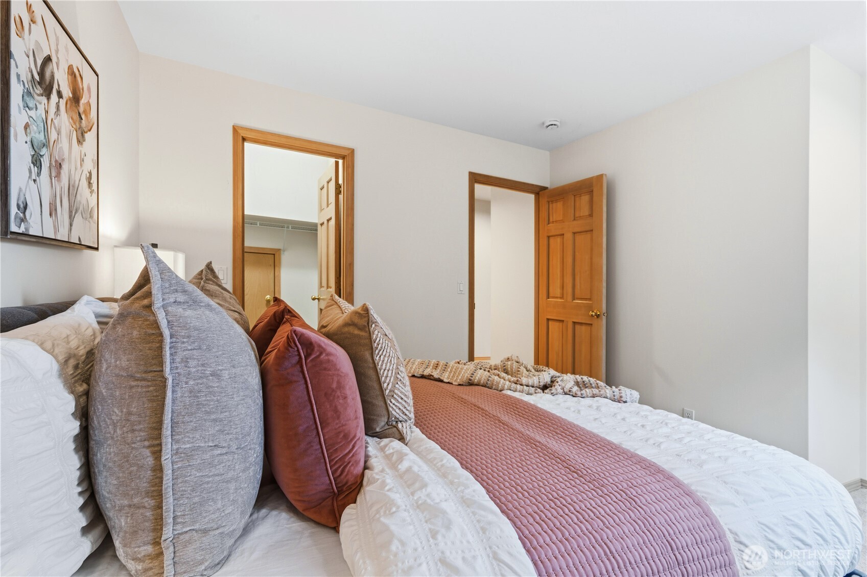2626 Northwest 204th Street Shoreline, WA 98177 - Photo 30 of 35 a bed room with a bed and a mirror