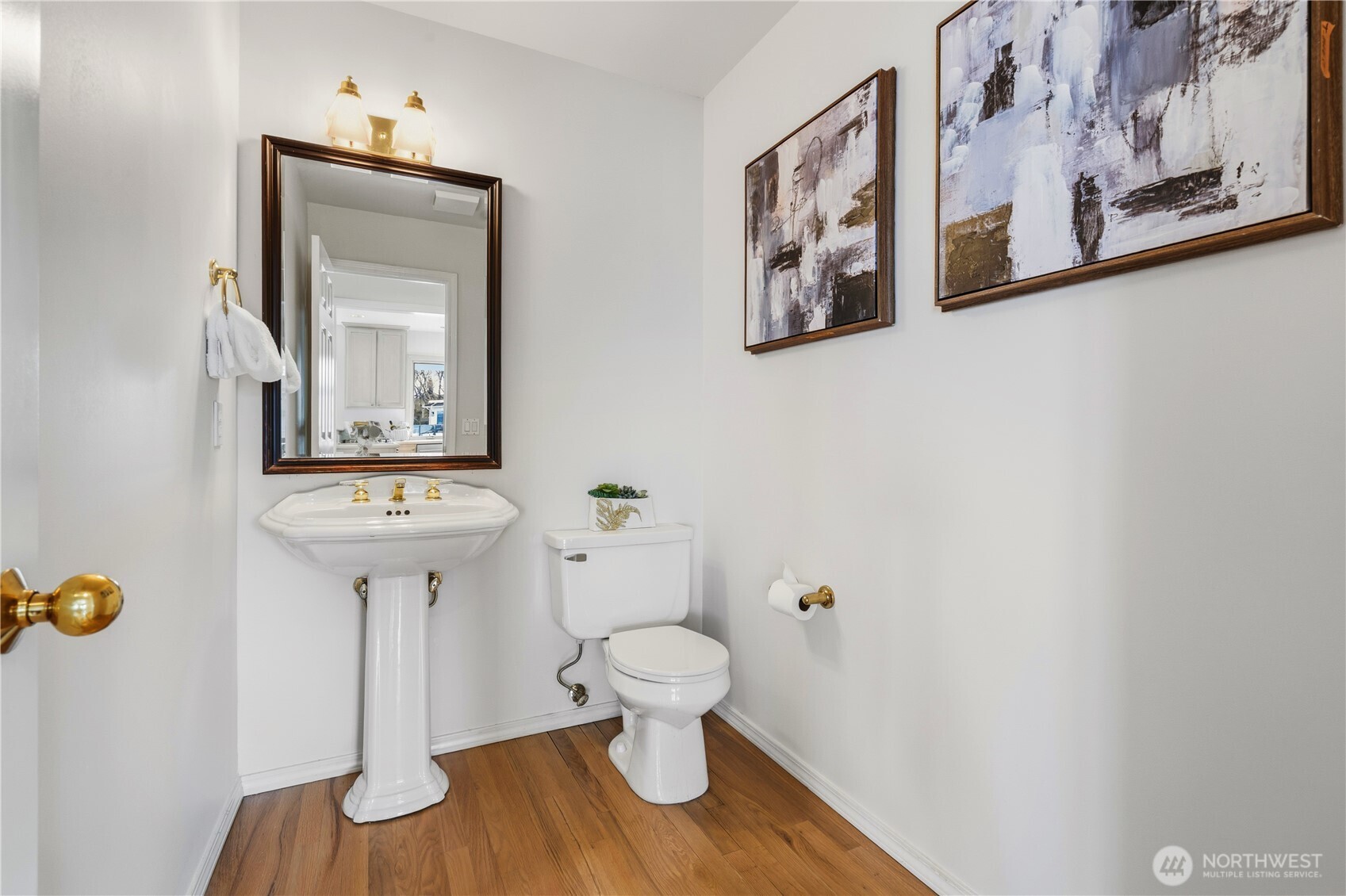 2626 Northwest 204th Street Shoreline, WA 98177 - Photo 7 of 35 a bathroom with a toilet and a mirror