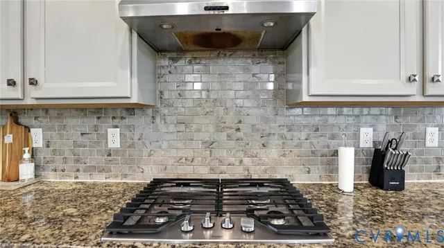 a view of a dining room and chairs