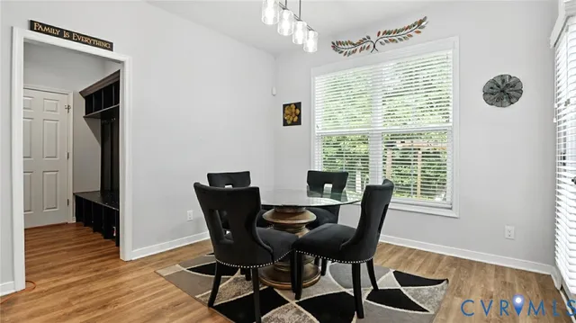 a view of a dining room with furniture