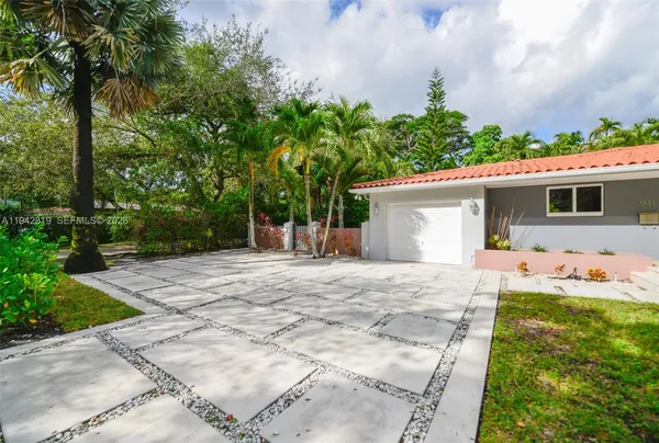 front view of a house with a patio